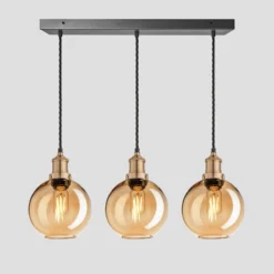 Brooklyn Tinted Glass Globe 3 Wire Cluster Lights - 7 Inch - Amber -Industville Shop 7 Inch Pendant Glass Industville Lighting Globe BrassHolder Brooklyn BR TGL GL7 3WCL A BH