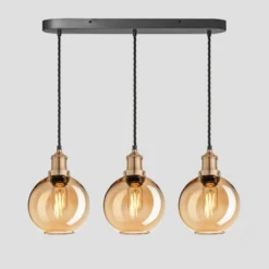 Brooklyn Tinted Glass Globe 3 Wire Cluster Lights - 7 Inch - Amber -Industville Shop 7 Inch Pendant Glass Industville Lighting Globe BrassHolder Brooklyn BR TGL GL7 3WOCL A BH