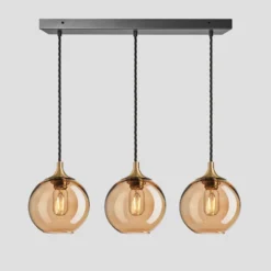 Chelsea Tinted Glass Globe 3 Wire Cluster Lights - 7 Inch - Amber -Industville Shop 7 Inch Pendant Glass Industville Lighting Globe BrassHolder Chelsea CH TGL GL7 3WCL A BH