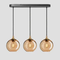 Chelsea Tinted Glass Globe 3 Wire Cluster Lights - 7 Inch - Amber -Industville Shop 7 Inch Pendant Glass Industville Lighting Globe BrassHolder Chelsea CH TGL GL7 3WOCL A BH