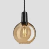 Sleek Tinted Glass Globe Pendant - 7 Inch - Amber