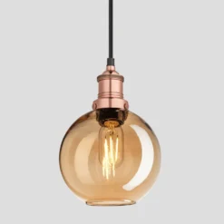 Brooklyn Tinted Glass Globe Pendant - 7 Inch - Amber -Industville Shop 7 Inch Pendant Tinted Glass Amber Globe Copper Brooklyn BR TGL GLP7 A CH Lit