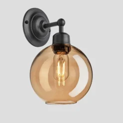 Orlando Tinted Glass Globe Wall Light - 7 Inch - Amber -Industville Shop 7 Inch Wall Light Tinted Glass Amber Globe Pewter Orlando OR TGL GLWL7 A PH Angled Lit