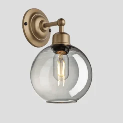Orlando Tinted Glass Globe Wall Light - 7 Inch - Smoke Grey 7 Orlando Tinted Glass Globe Wall Light - 7 Inch - Smoke Grey -Industville Shop 7 Inch Wall Light Tinted Glass Smoke Grey Globe Brass Orlando OR TGL GLWL7 SG BH Angled lit