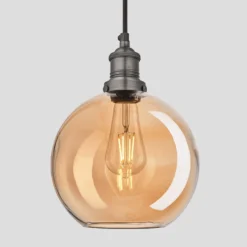Brooklyn Tinted Glass Globe Pendant - 9 Inch - Amber 7 Brooklyn Tinted Glass Globe Pendant - 9 Inch - Amber -Industville Shop 9 Inch Pendant Tinted Glass Amber Cone Pewter Brooklyn BR TGL CP9 A PH Lit