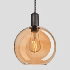 Sleek Tinted Glass Globe Pendant - 9 Inch - Amber 8 Sleek Tinted Glass Globe Pendant - 9 Inch - Amber -Industville Shop 9 Inch Pendant Tinted Glass Amber Globe Pewter Sleek SL TGL GLP9 A PH Lit