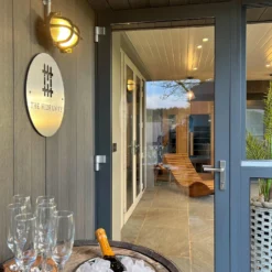 6 Inch Black Bulkhead Outdoor & Bathroom Oval Wall Light With Versatile Side & Rear Wiring Options 19 6 Inch Black Bulkhead Outdoor & Bathroom Oval Wall Light With Versatile Side & Rear Wiring Options -Industville Shop BK IP65 OWL6 BK BW RB LR INDUSTVILLE B2C OUTDOORS CHAMPAGNE CHAMPAGNE FLUTE DOORS The Hideaway Retreat insitu