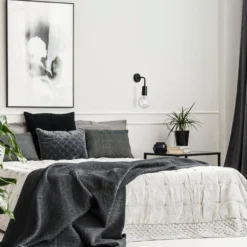 Sleek Edison Wall Light - Black -Industville Shop SL EWL BK INDUSTVILLE B2C Angled Bedroom AdobeStock 1